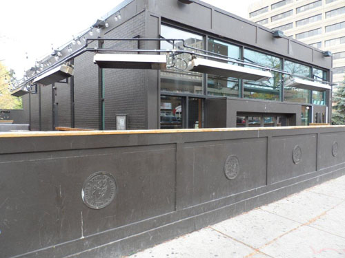 infrared-patio-heaters-mounted-around-the-building-with-pipe