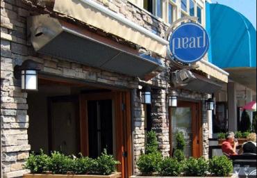 outdoor-infrared-heaters-mounted-above-sidewalk-cafe