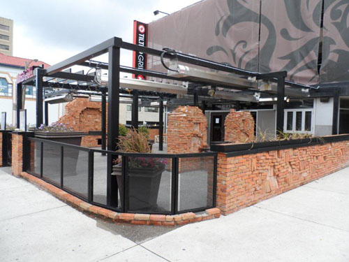 uncovered-restaurant-patio-with-infrared-heaters-mounted-above