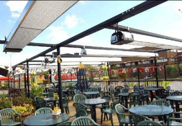 restaurant-infrared-patio-heaters-mounted-above-uncovered-patio