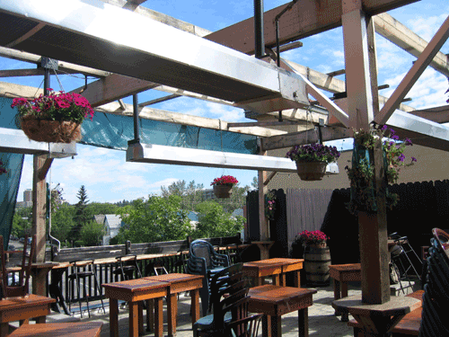 uncovered-patio-with-outdoor-infrared-heating-units-and-low-clearance-to-combustibles